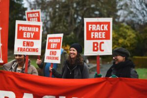 Frack Free BC protest outside David Eby's swearing in ceremony in Dec 2022 calling for an end to fracking and LNG in BC.