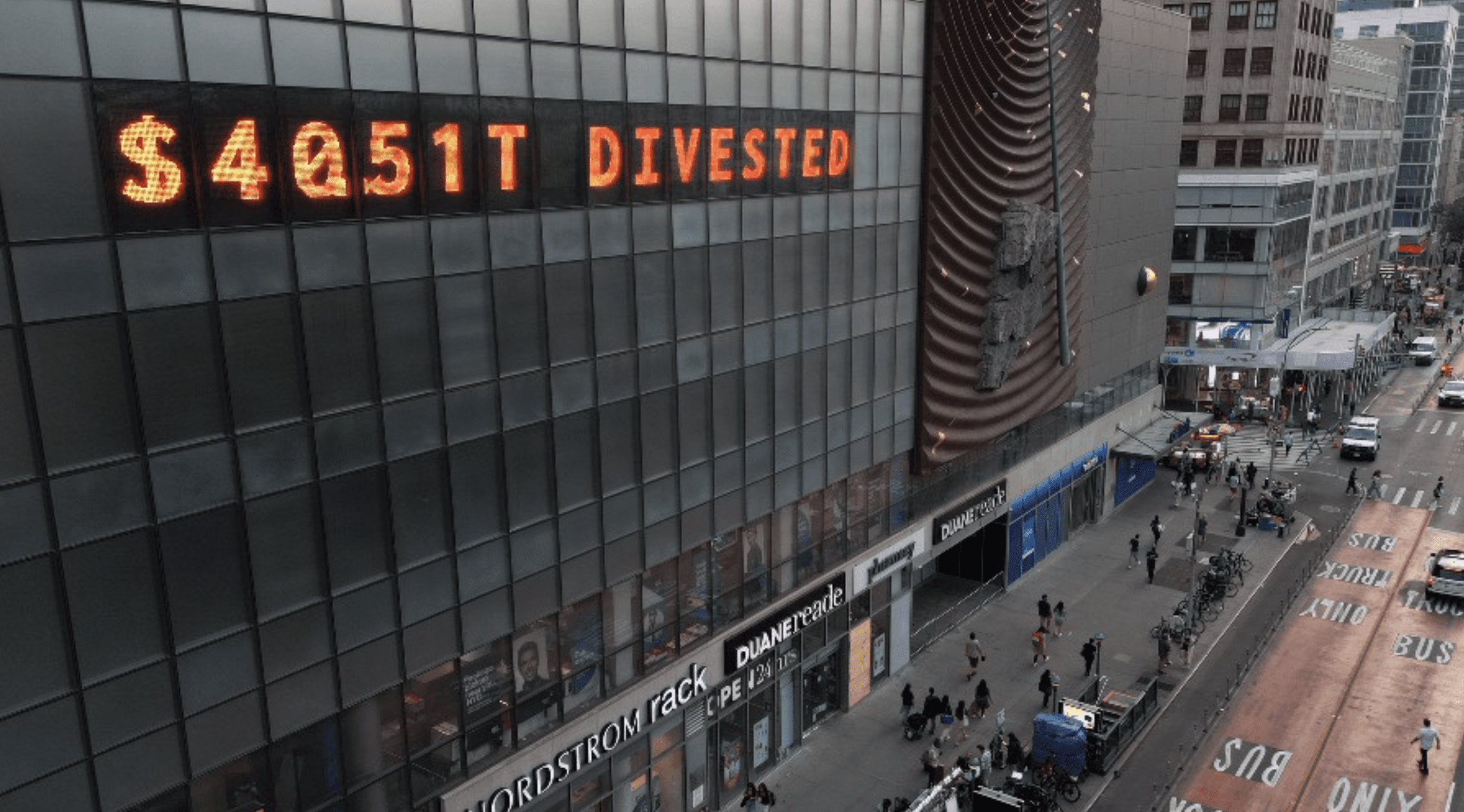 Union Square NYC Climate Clock reading $40.51 T DIVESTED