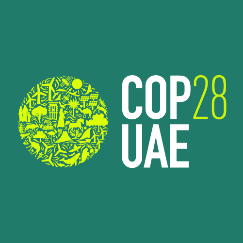 COP28 UAE written in white bold text with a green cirlce with little icons inside of the circle against a green background.