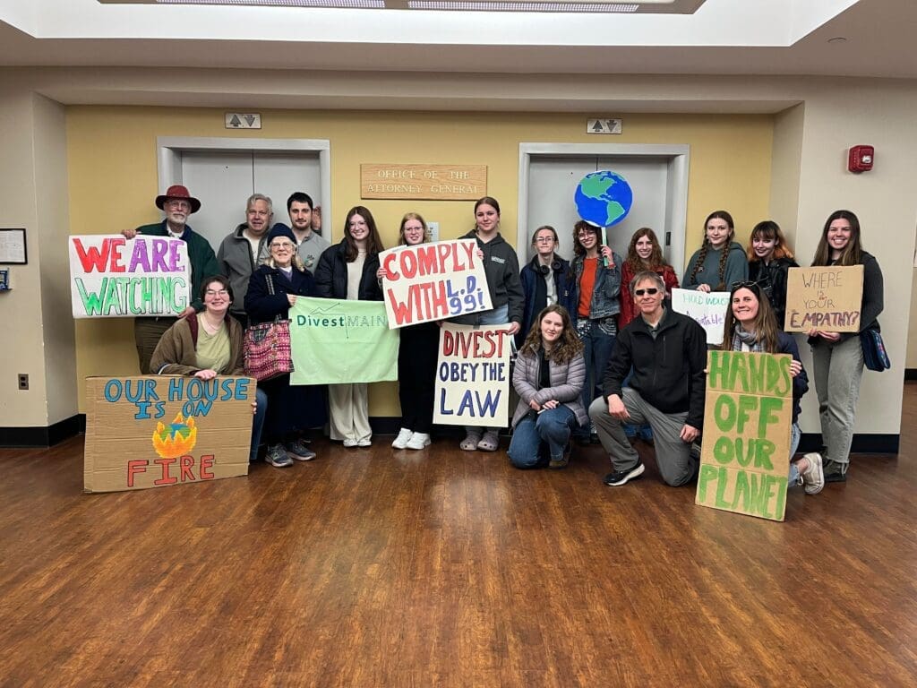 Group of activists attending a youth-organized event pushing the Maine Public Employees Retirement System and Attorney General to implement a fossil fuel divestment law