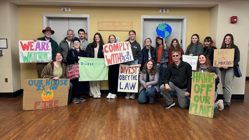 Group of activists attending a youth-organized event pushing the Maine Public Employees Retirement System and Attorney General to implement a fossil fuel divestment law