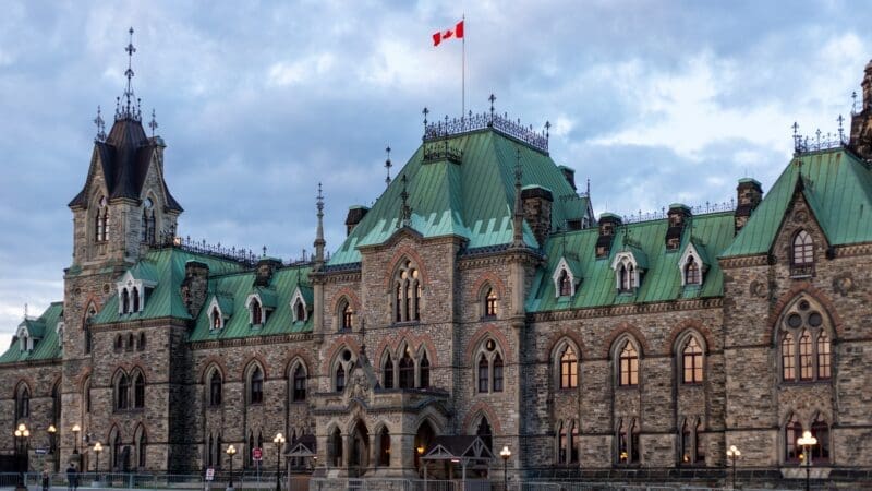 Ottawa, Canada - May 16, 2024: Parliament Hill, East Block building with Canadian flag