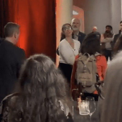 Peaceful protestor disrupts BC NDP fundraising convention.